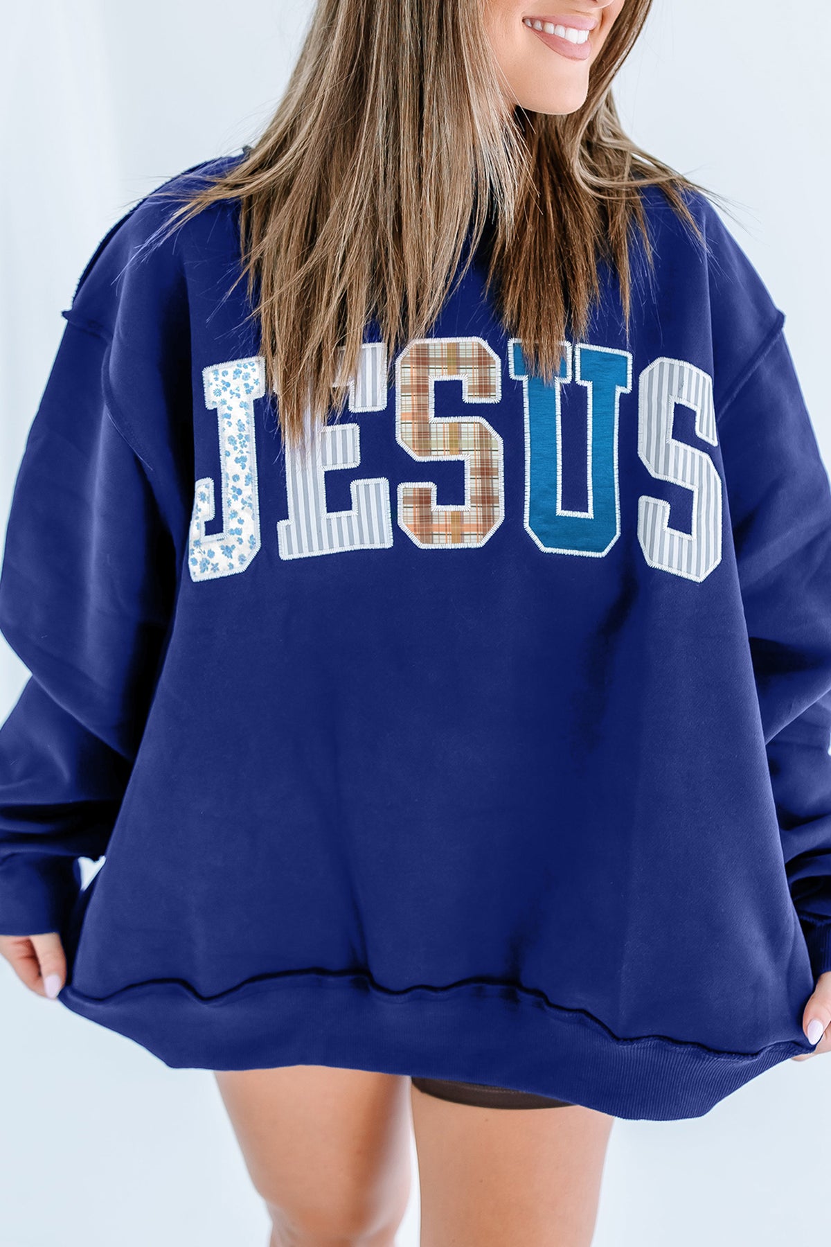 Bonbon WWJD Mixed Pattern Embroidered Patch Graphic Mock Neck Sweatshirt