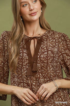 YSONA Umgee Mix Geometric Print V-Neck Tassel Detail Tunic Dress — close-up view | Women's Dress