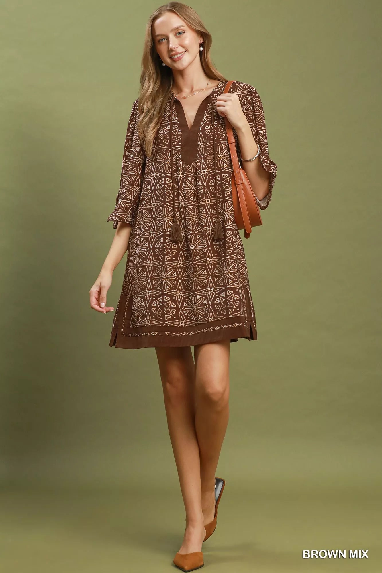 YSONA Umgee Mix Geometric Print V-Neck Tassel Detail Tunic Dress — model wearing | Women's Dress