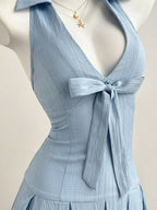 YSONA Halter Neck Bow Tie Pleated Mini Dress — detail view | Women's Dress | Shop YSONA